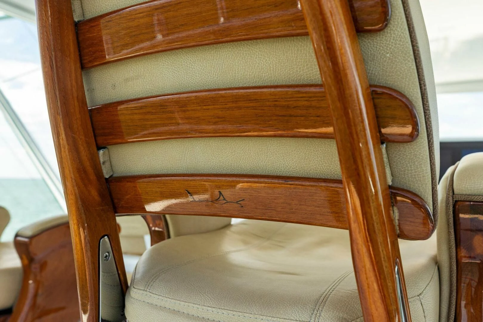 a wooden chair with a seat aboard THE PROVIDER Yacht for Sale