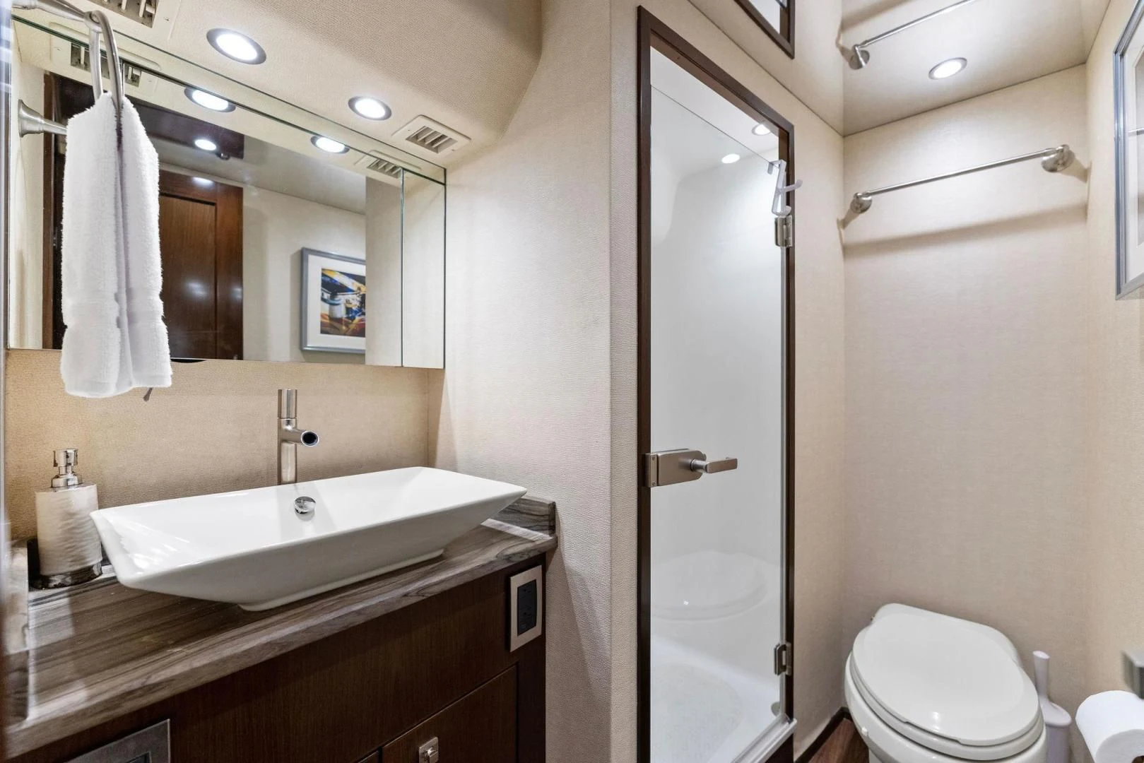 a bathroom with a glass shower aboard THE PROVIDER Yacht for Sale