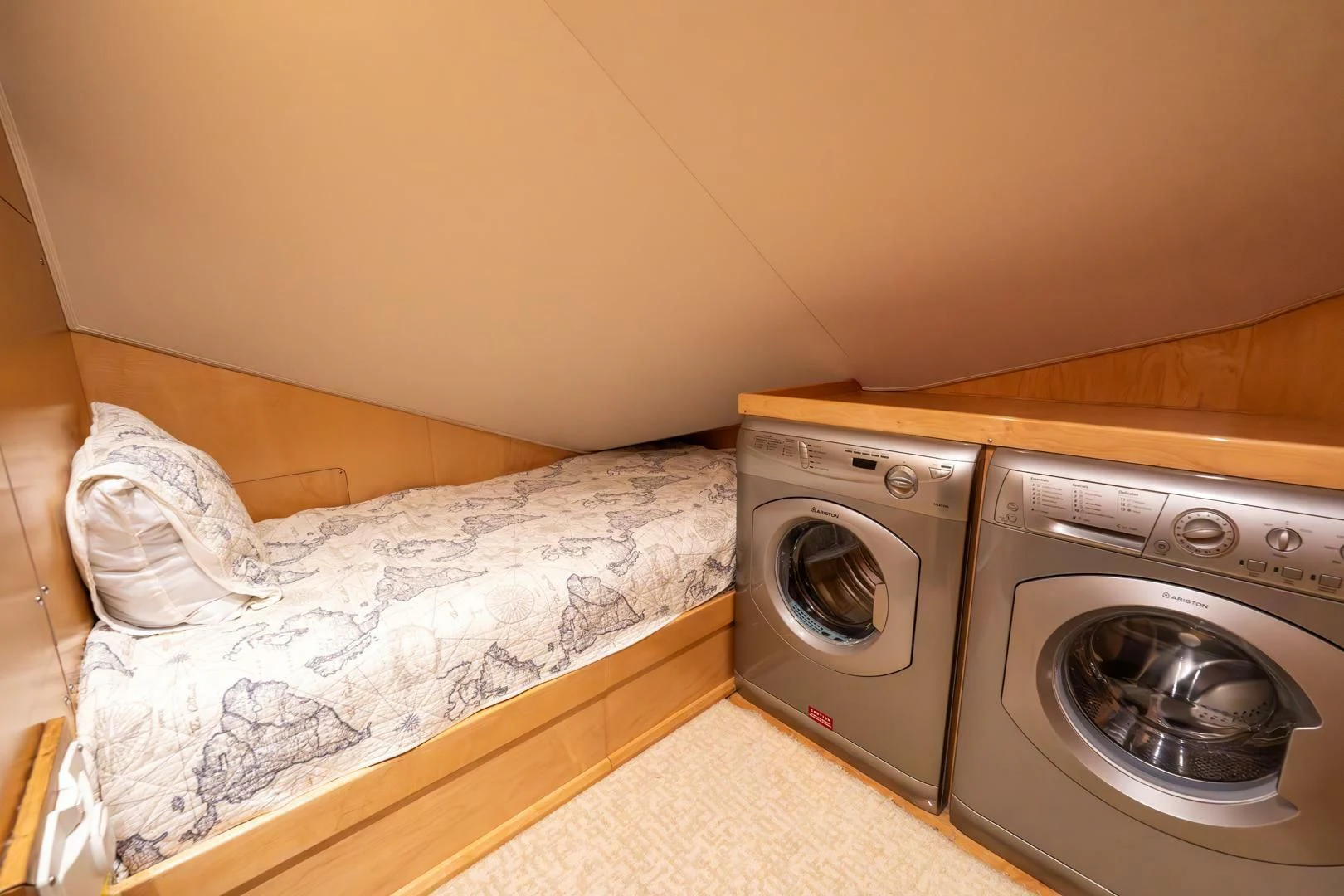 a bed next to a washing machine aboard THE PROVIDER Yacht for Sale