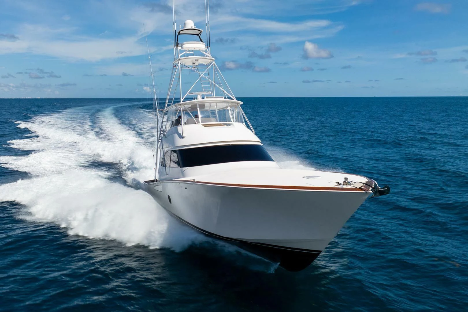 a white boat on the water aboard THE PROVIDER Yacht for Sale