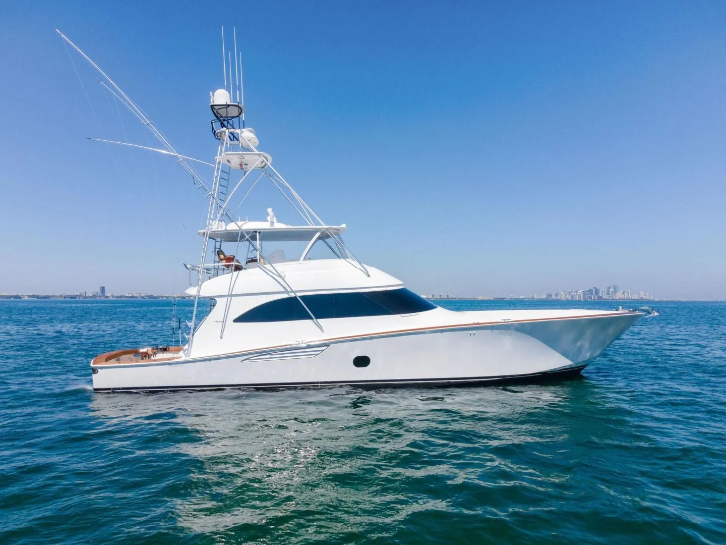 a white boat in the water aboard THE PROVIDER Yacht for Sale