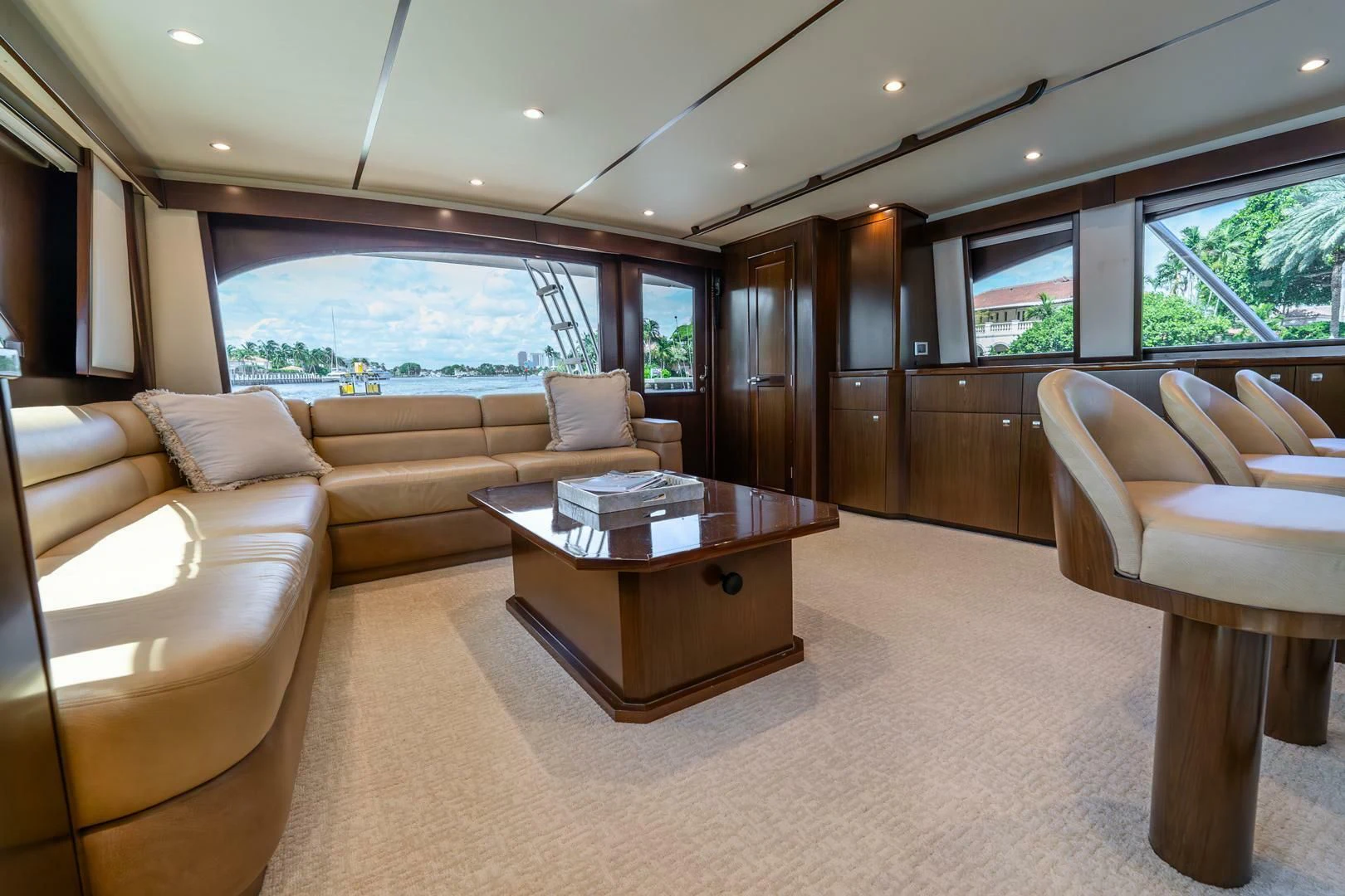 a living room with a table and chairs aboard THE PROVIDER Yacht for Sale