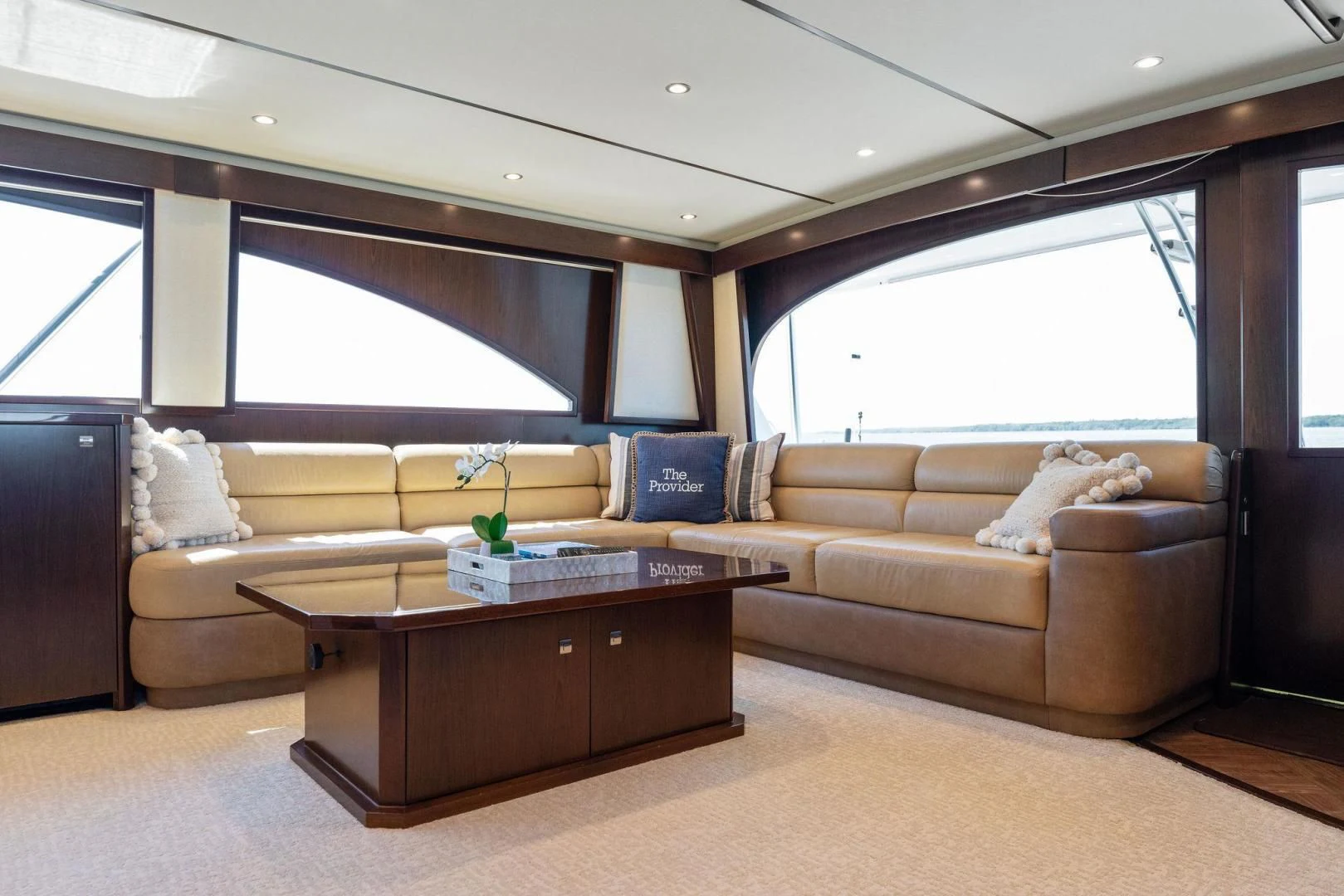 a living room with a couch and a coffee table aboard THE PROVIDER Yacht for Sale