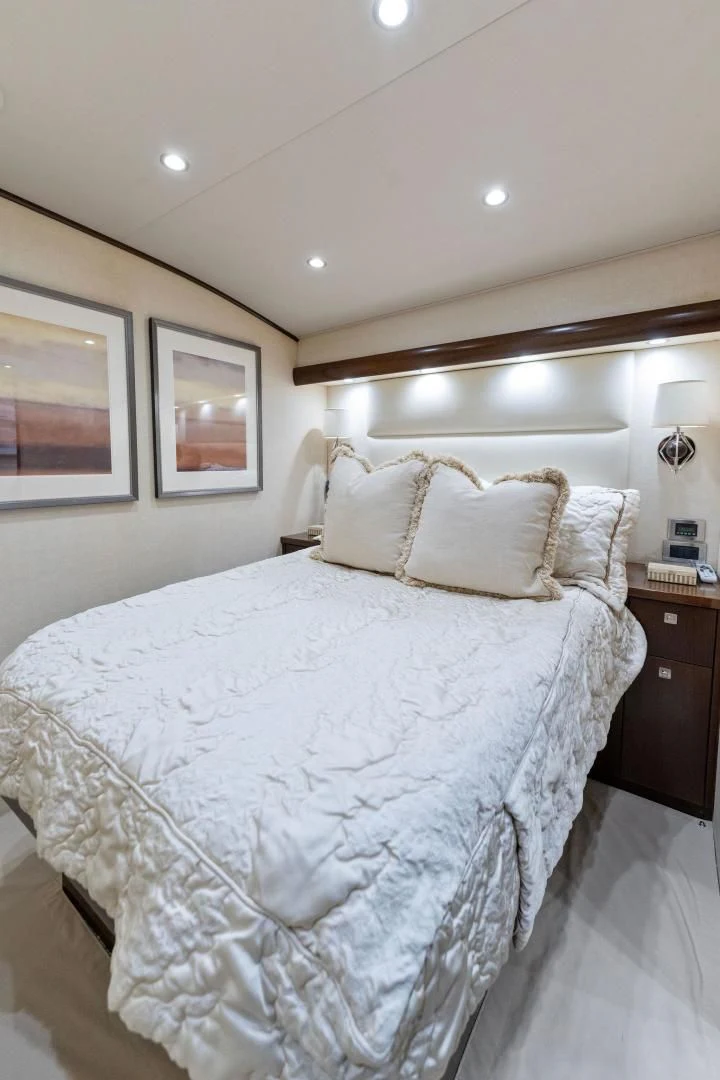 a bed with white sheets aboard THE PROVIDER Yacht for Sale