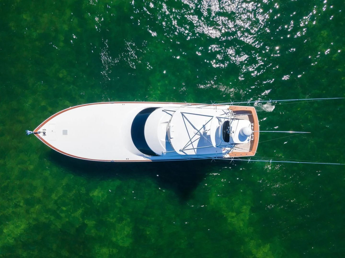 a white and black boat on water aboard THE PROVIDER Yacht for Sale