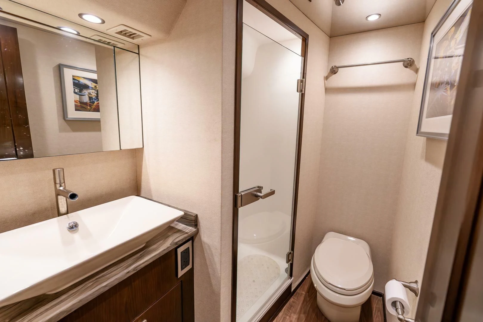 a bathroom with a toilet and a bathtub aboard THE PROVIDER Yacht for Sale