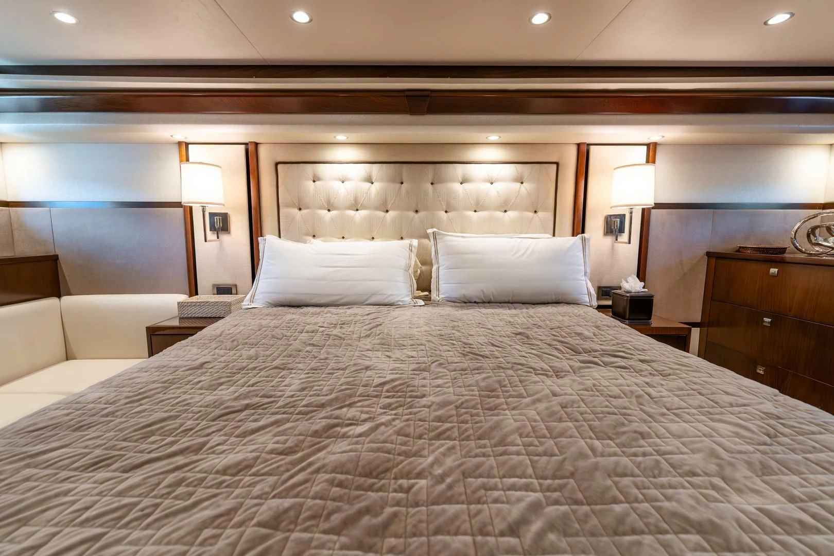 a large bed with white pillows aboard THE PROVIDER Yacht for Sale