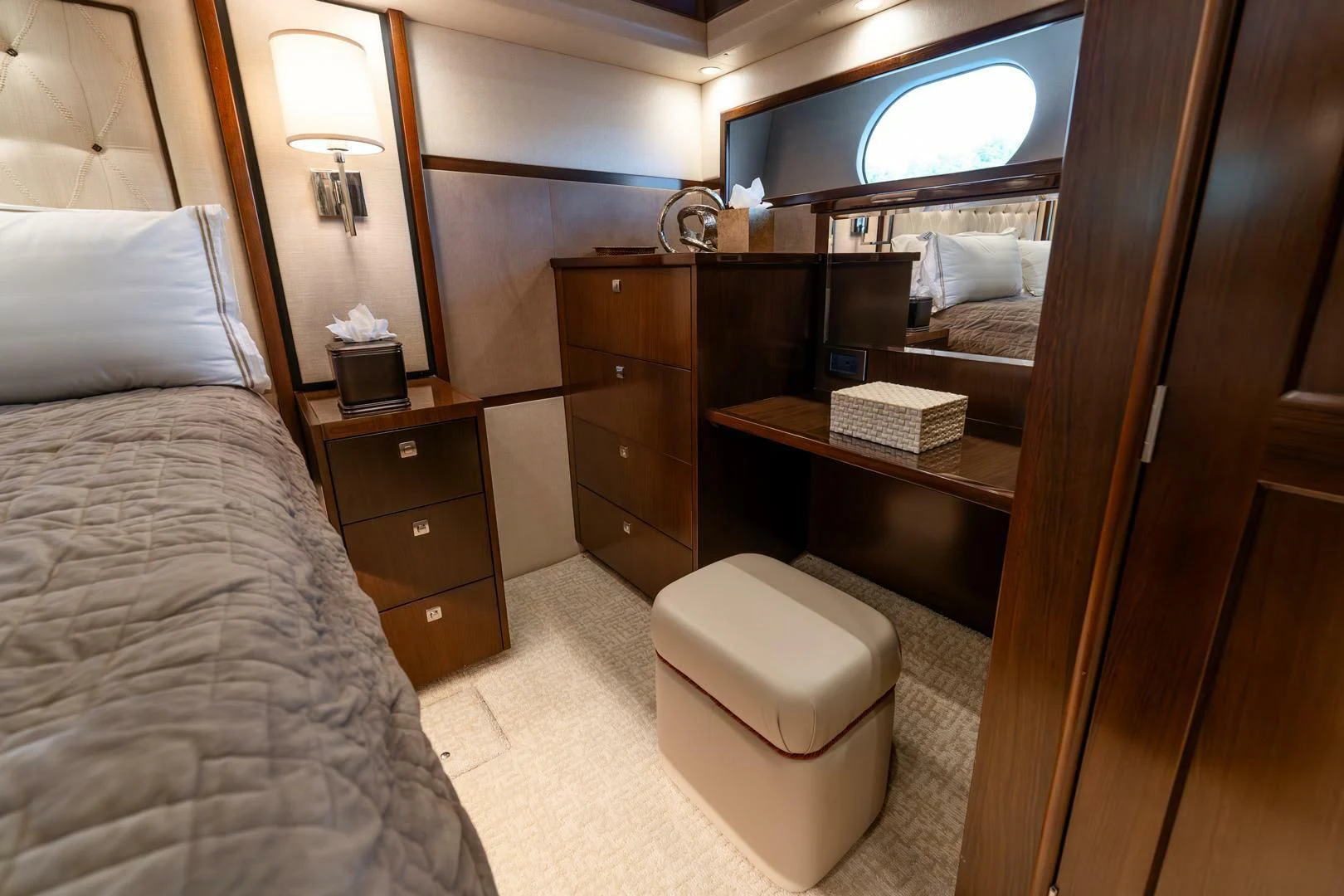 a bedroom with a bed and a desk aboard THE PROVIDER Yacht for Sale