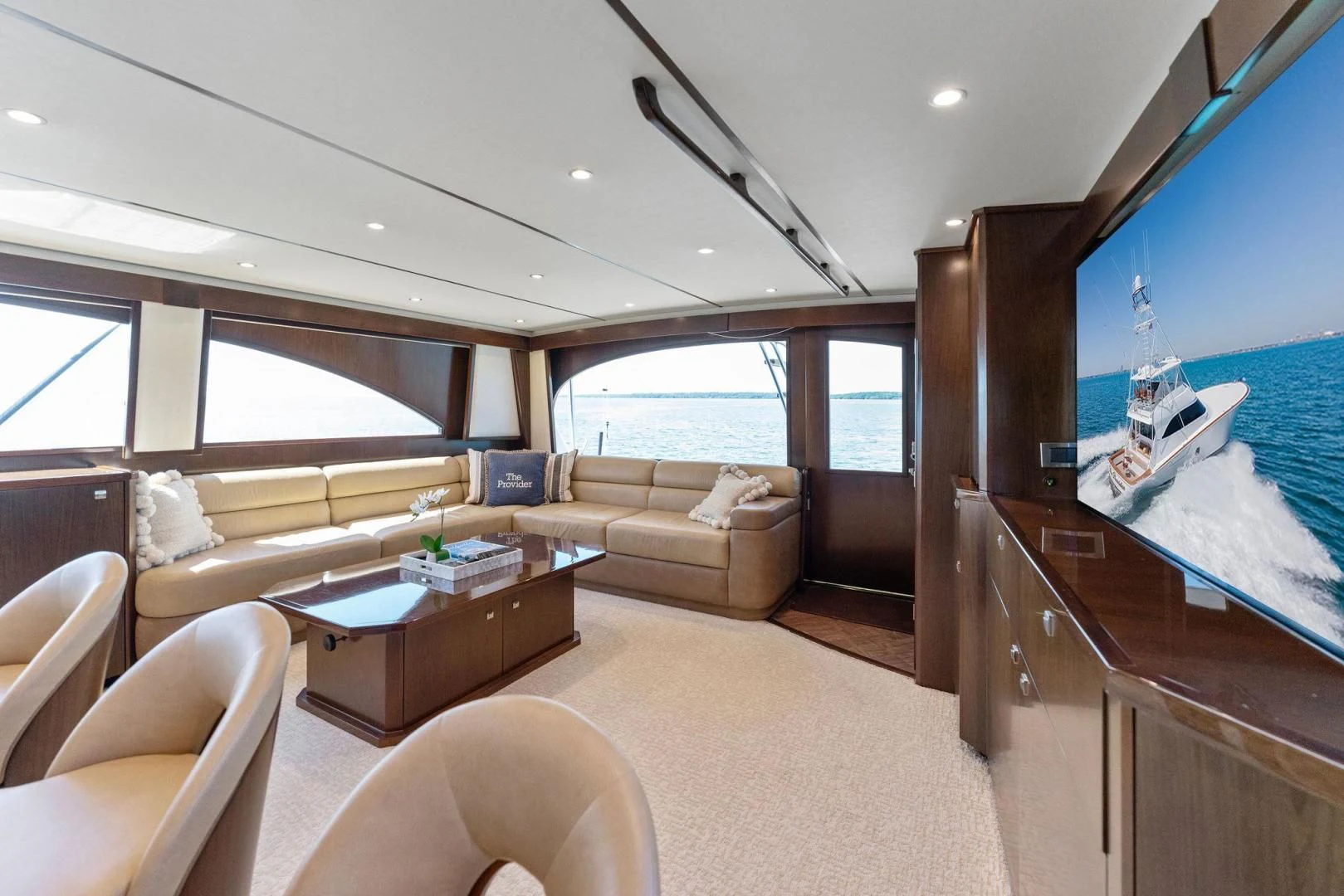 a living room with a large bed aboard THE PROVIDER Yacht for Sale