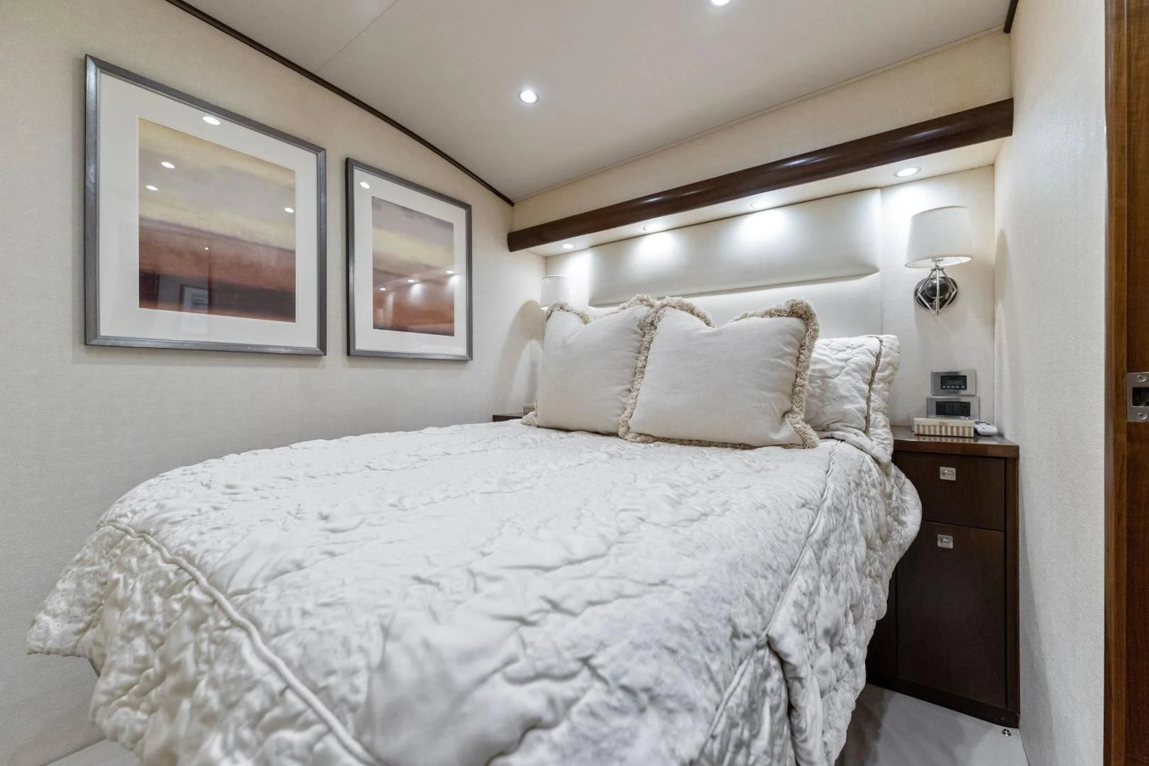a bed with white sheets aboard THE PROVIDER Yacht for Sale