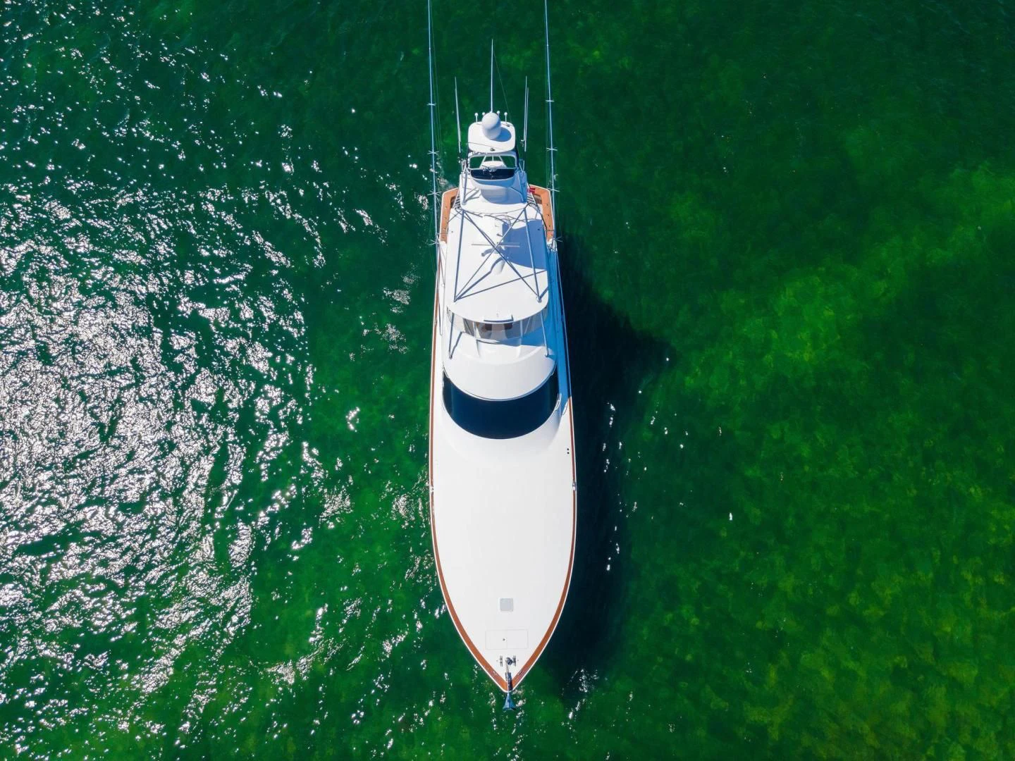 a white and black boat in the water aboard THE PROVIDER Yacht for Sale