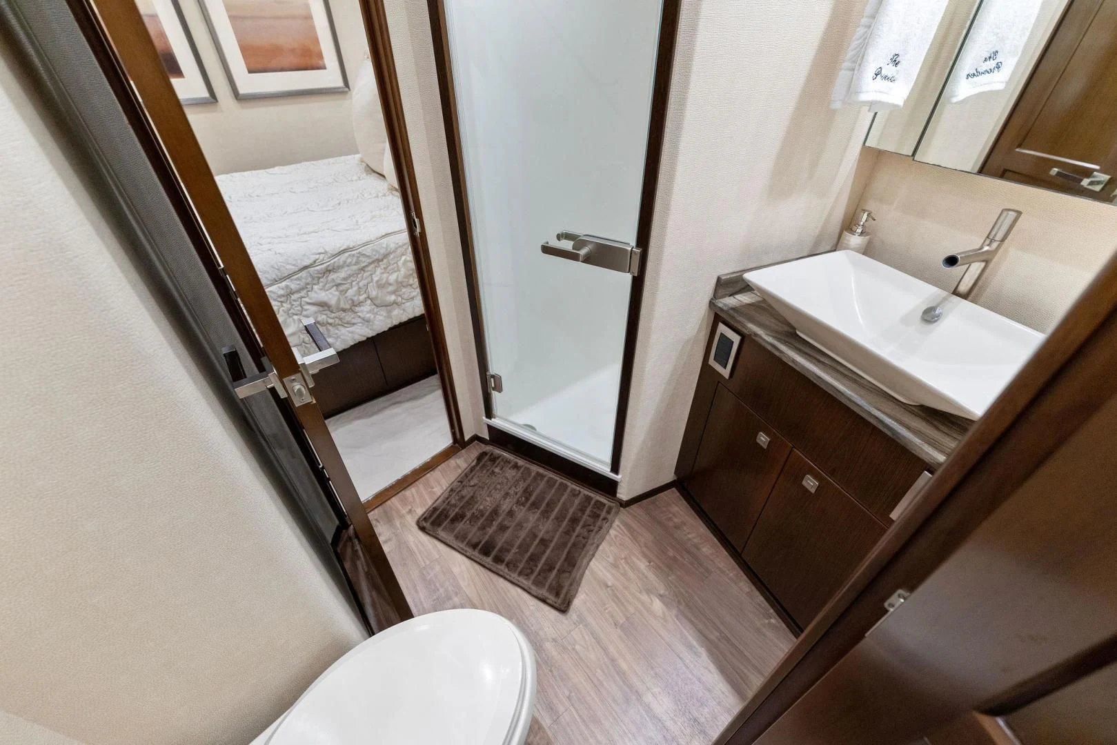 a bathroom with a sink and a mirror aboard THE PROVIDER Yacht for Sale