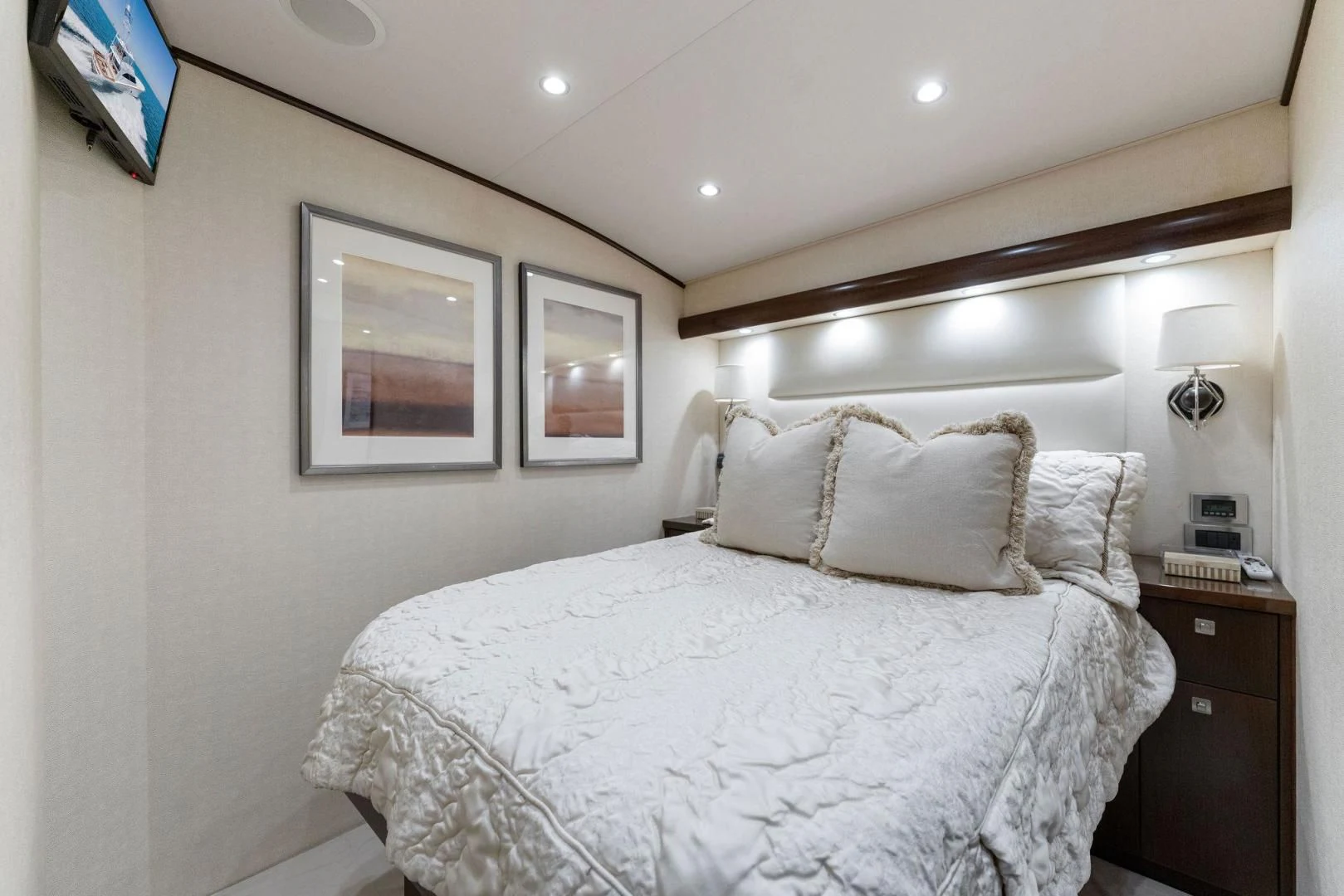 a bed with white sheets aboard THE PROVIDER Yacht for Sale