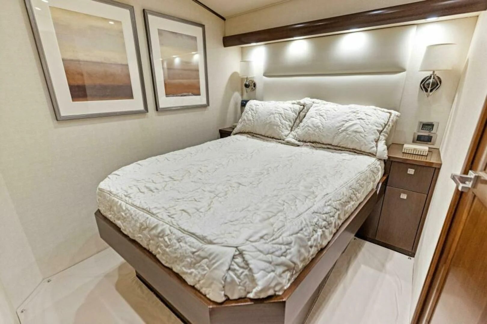 a bed with white sheets aboard THE PROVIDER Yacht for Sale