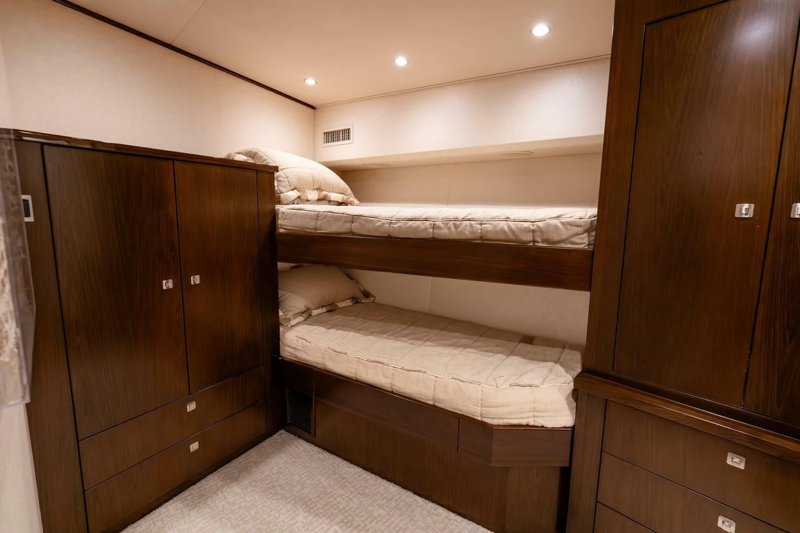 a cat lying on a bed aboard THE PROVIDER Yacht for Sale