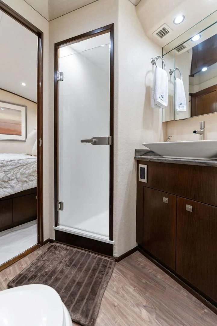 a bathroom with a sink and a mirror aboard THE PROVIDER Yacht for Sale