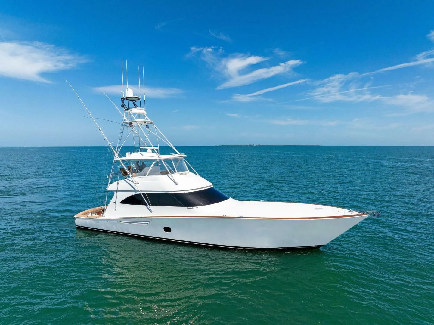 a white boat in the water aboard THE PROVIDER Yacht for Sale