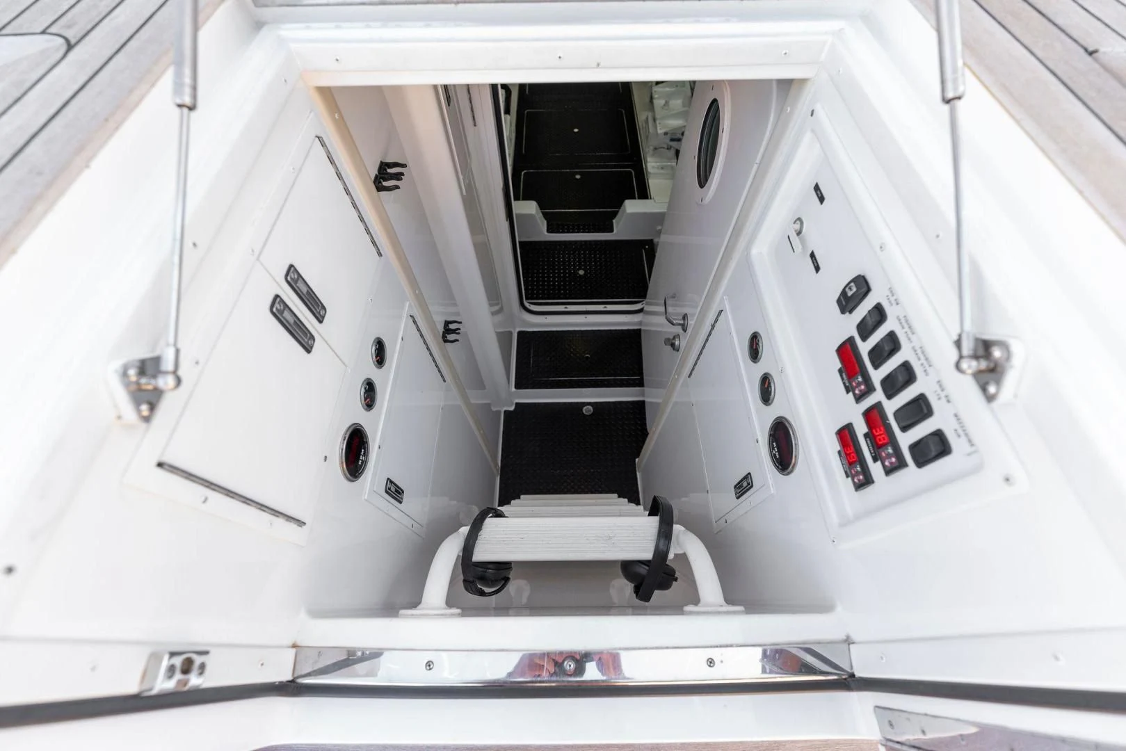 a white room with a table and chairs aboard THE PROVIDER Yacht for Sale