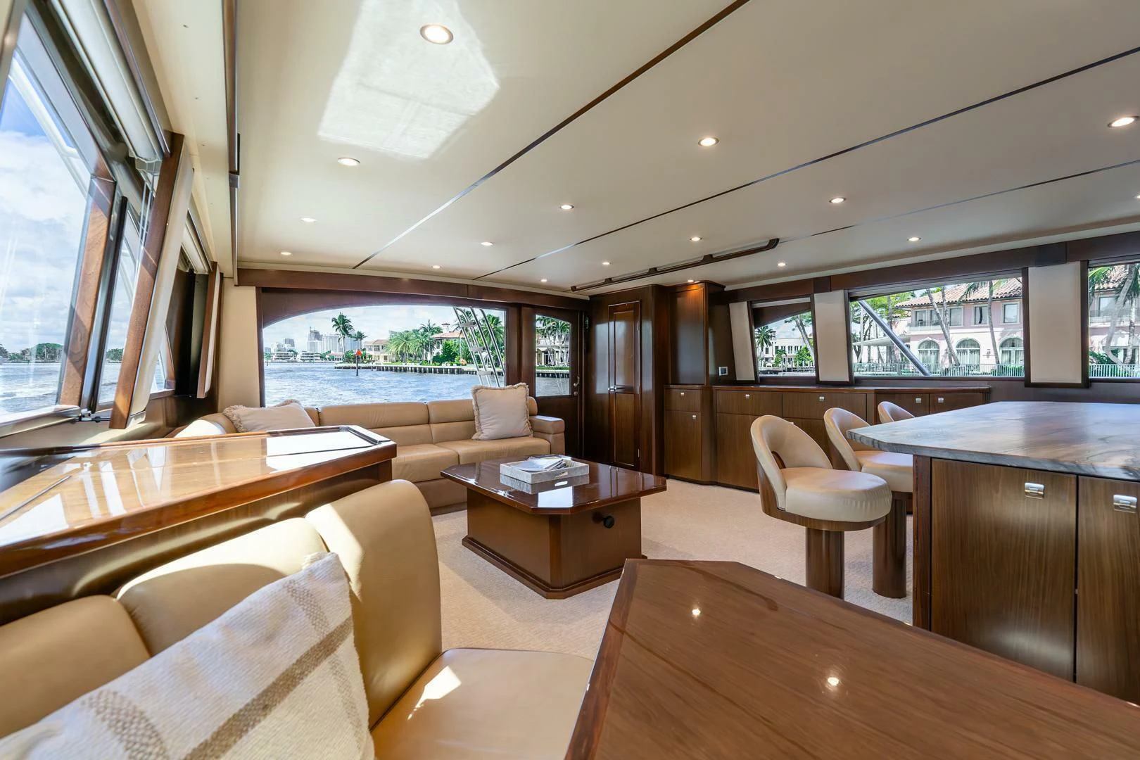 a living room with a table and chairs aboard THE PROVIDER Yacht for Sale