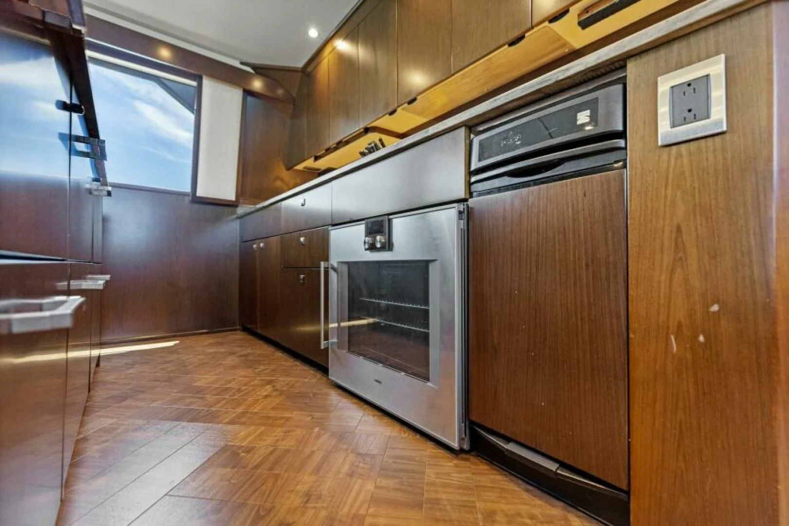 a kitchen with stainless steel appliances aboard THE PROVIDER Yacht for Sale