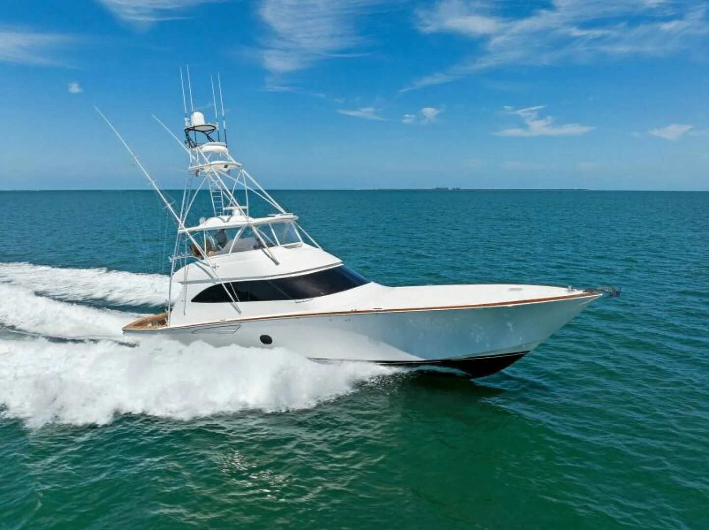 a white boat in the water aboard THE PROVIDER Yacht for Sale