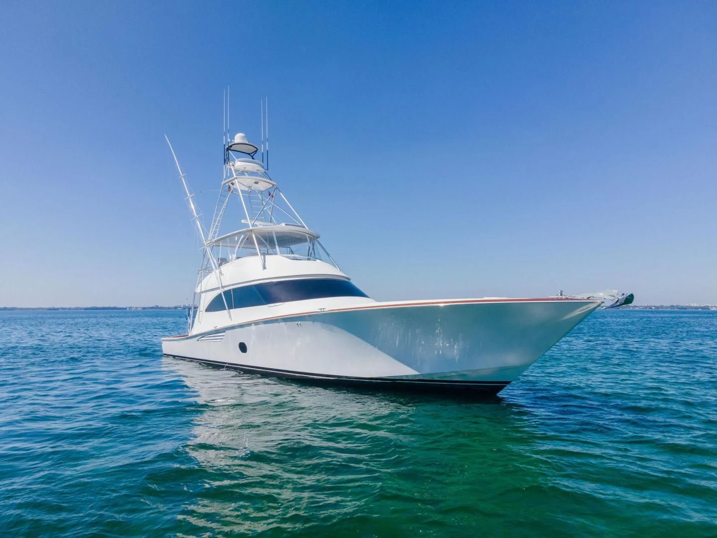 a white boat in the water aboard THE PROVIDER Yacht for Sale