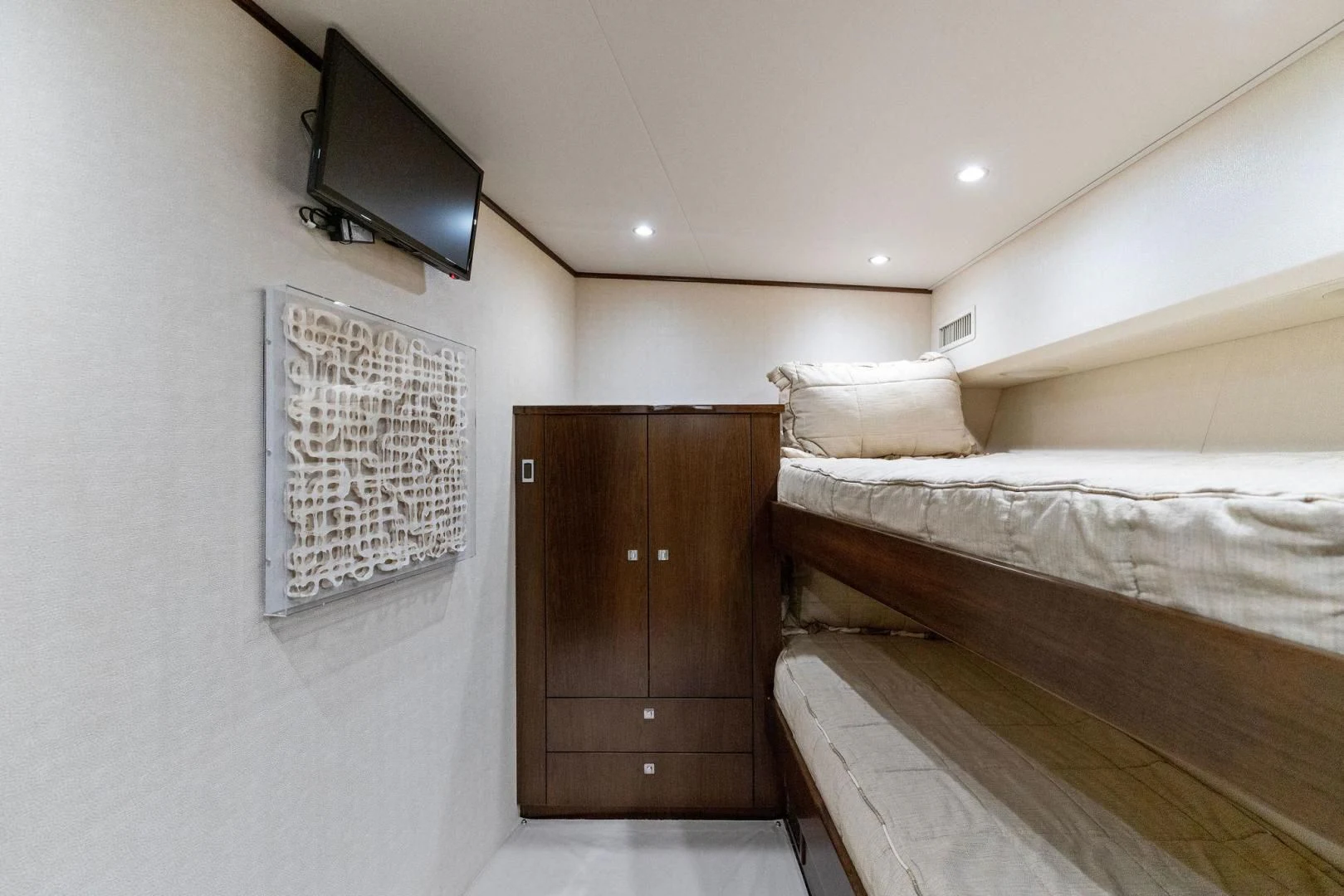 a bedroom with two beds aboard THE PROVIDER Yacht for Sale