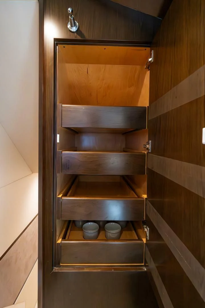 a wooden cabinet with a shelf aboard THE PROVIDER Yacht for Sale