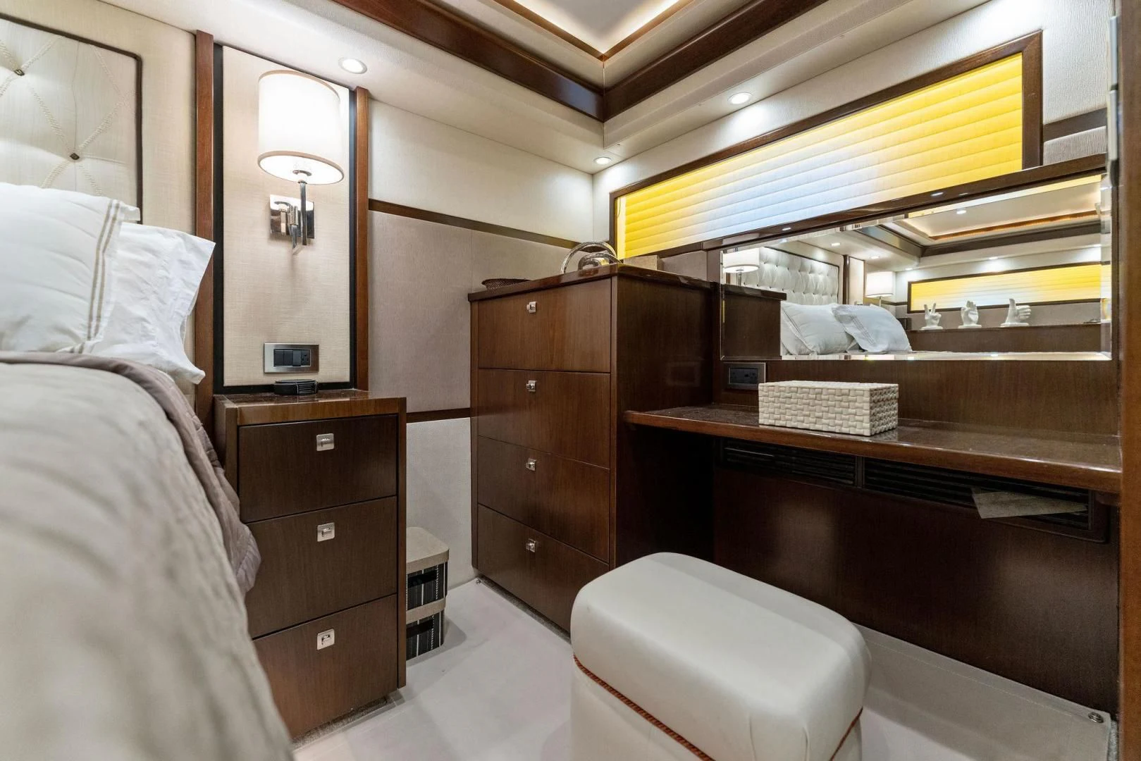 a bedroom with a bed and a desk aboard THE PROVIDER Yacht for Sale