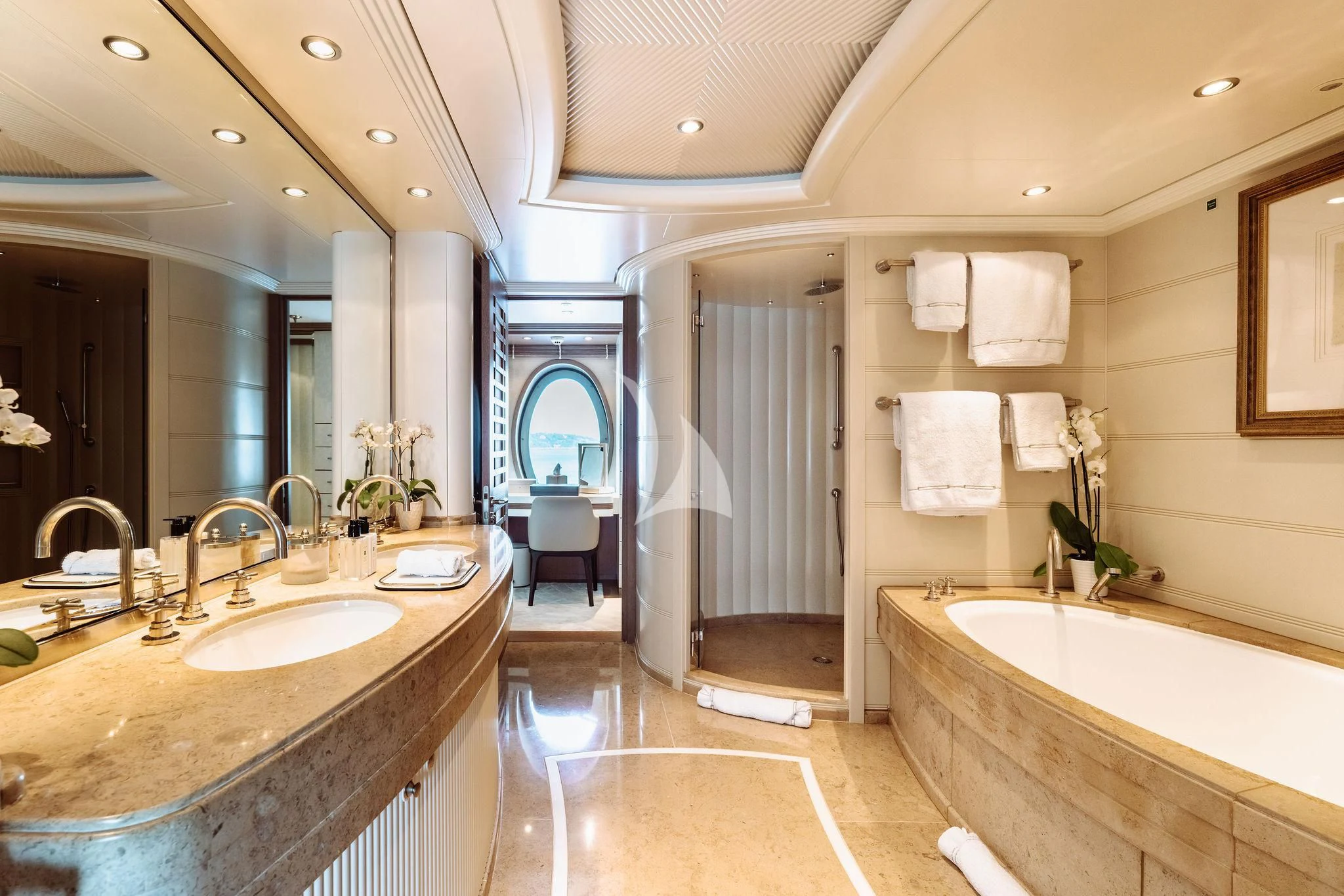 a bathroom with a tub sink and a sink aboard SAMIRA Yacht for Sale