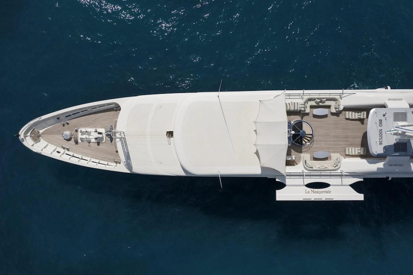 a large white ship in the water aboard SAMIRA Yacht for Sale