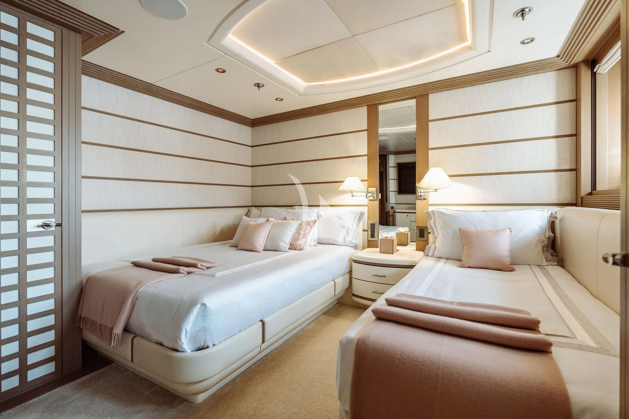 a room with two beds aboard SAMIRA Yacht for Sale