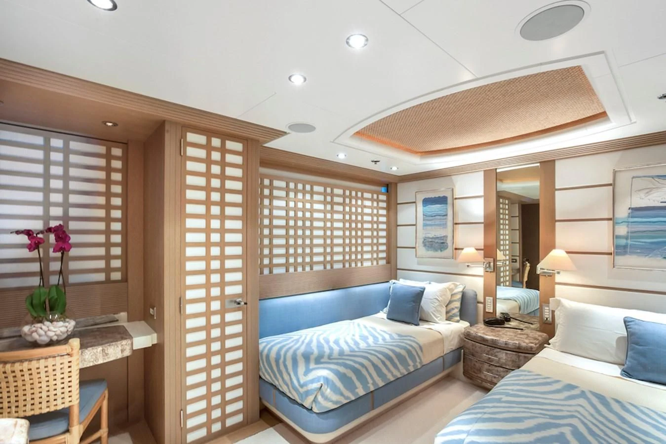 a room with a bed and a door aboard SAMIRA Yacht for Sale
