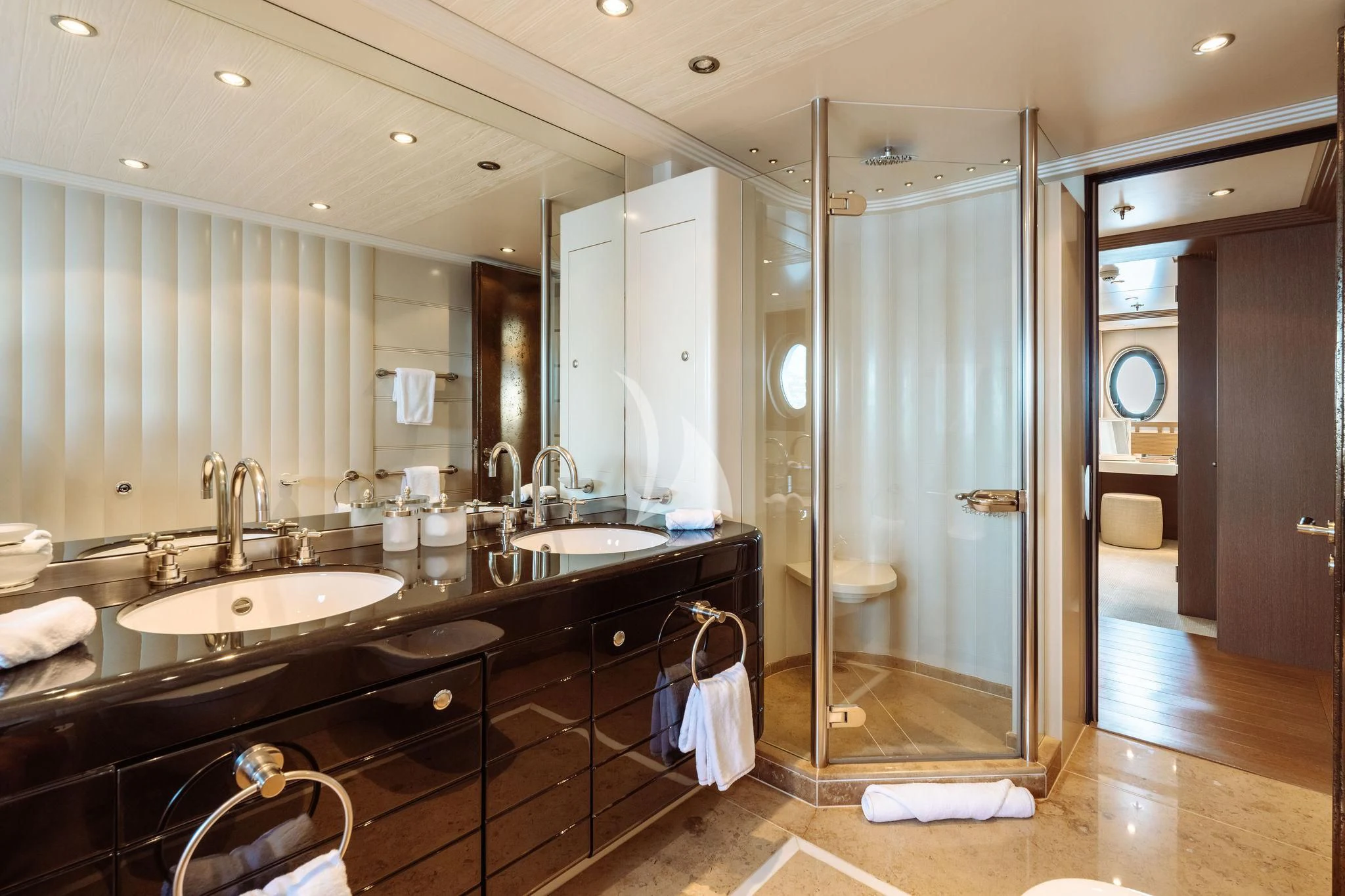 a bathroom with a large mirror aboard SAMIRA Yacht for Sale