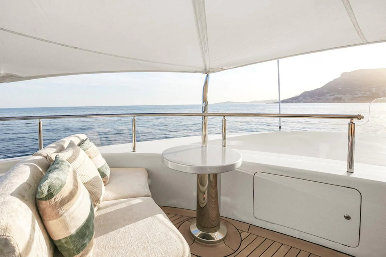 a table with a pillow on it aboard SAMIRA Yacht for Sale