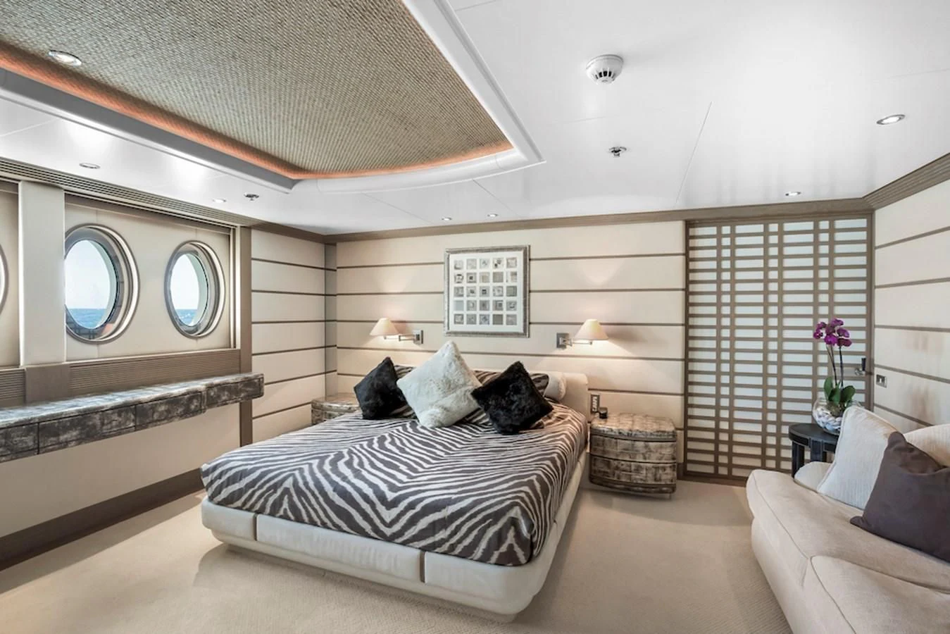 a large bedroom with a large bed aboard SAMIRA Yacht for Sale