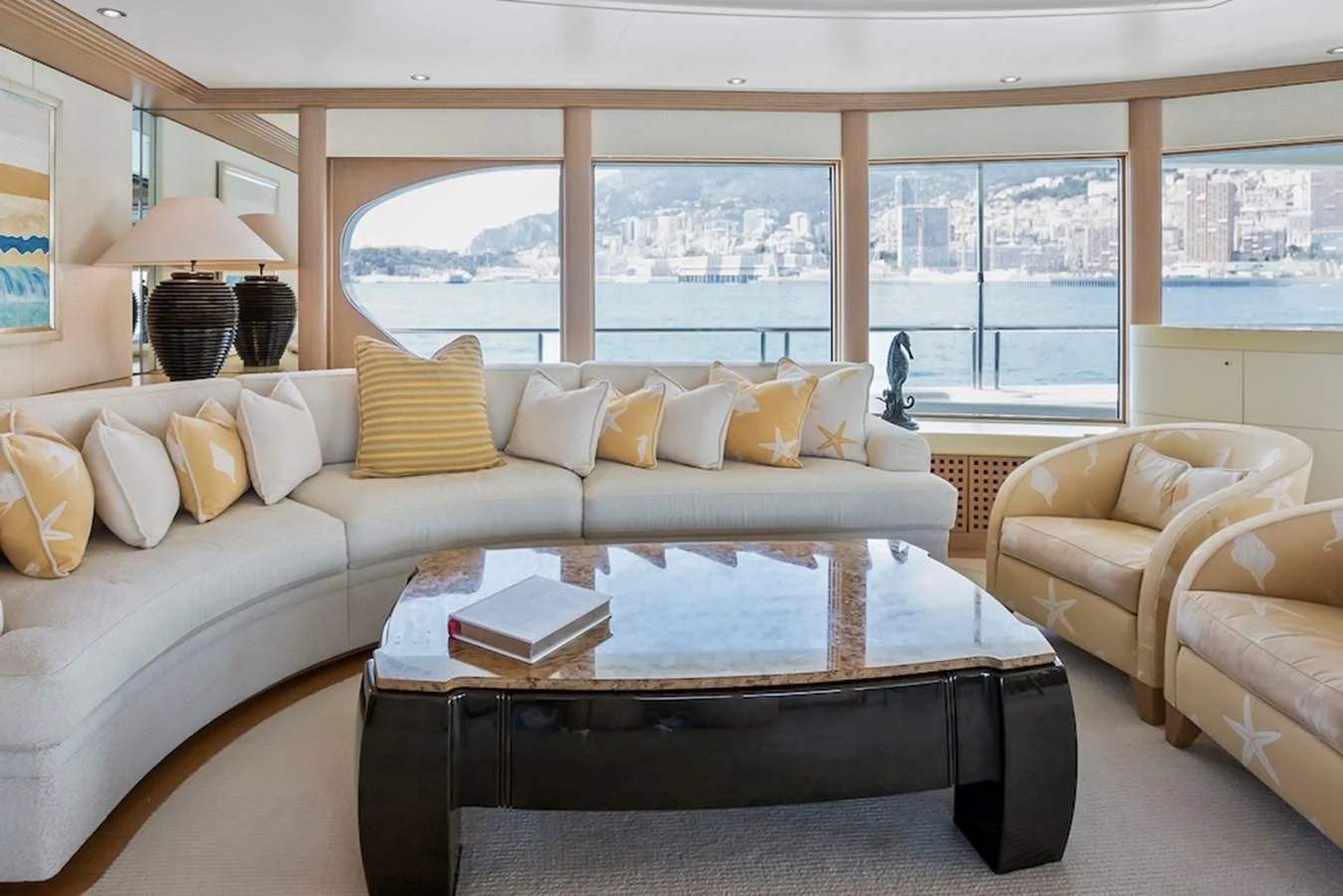 a living room with a large window aboard SAMIRA Yacht for Sale