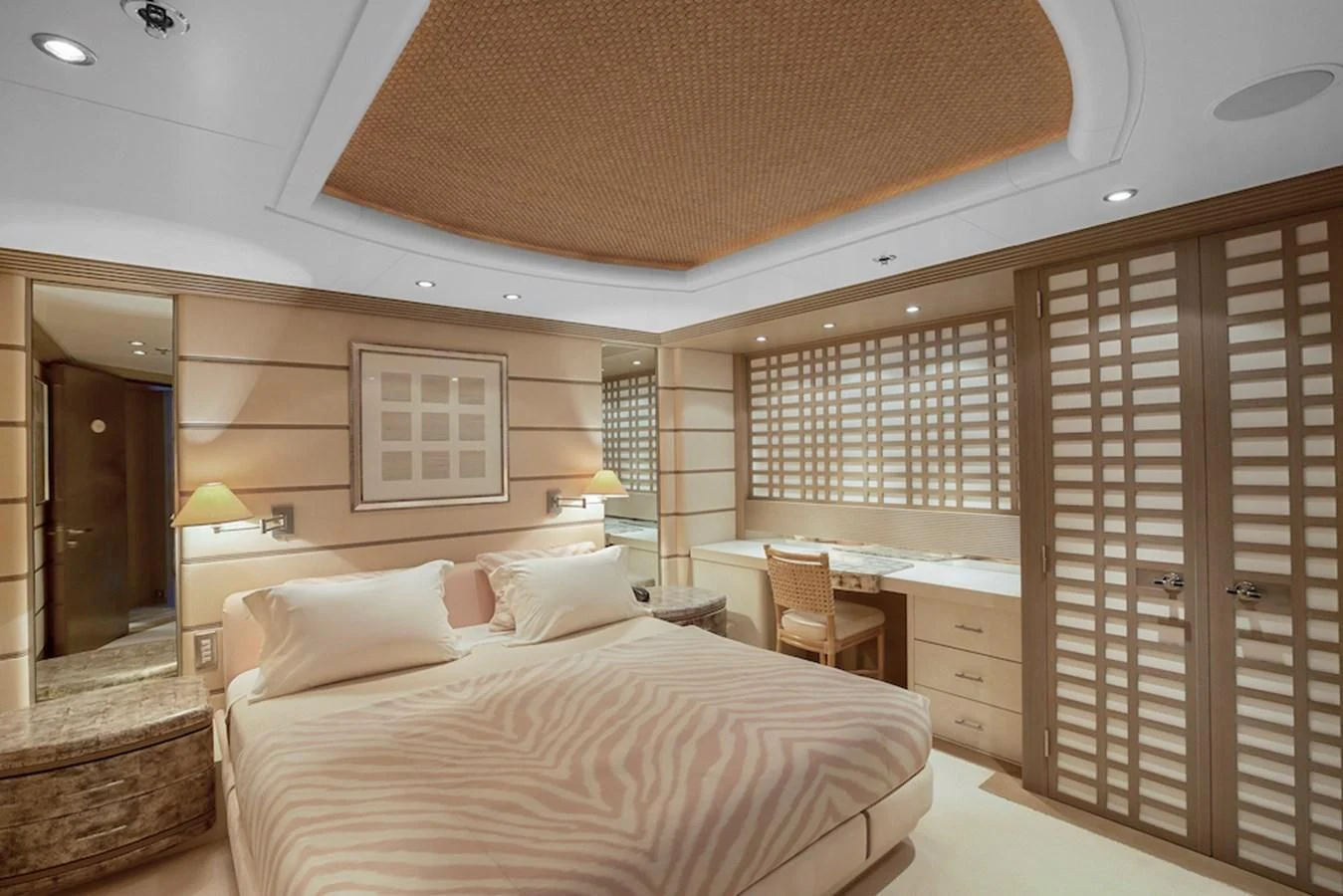 a large bedroom with a large bed aboard SAMIRA Yacht for Sale