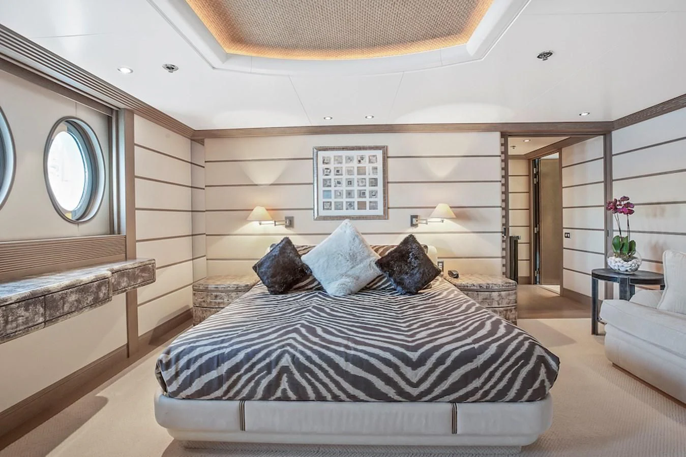 a large bed in a room aboard SAMIRA Yacht for Sale
