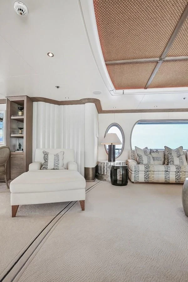 a room with a bed and a window aboard SAMIRA Yacht for Sale