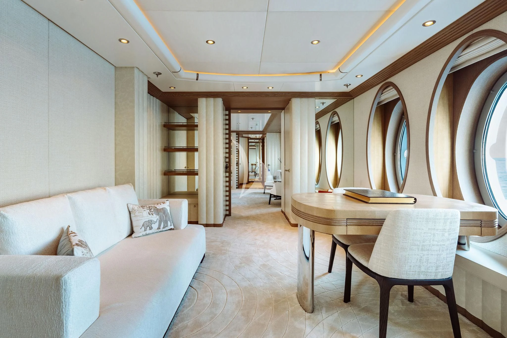 a room with a couch and a table and chairs aboard SAMIRA Yacht for Sale