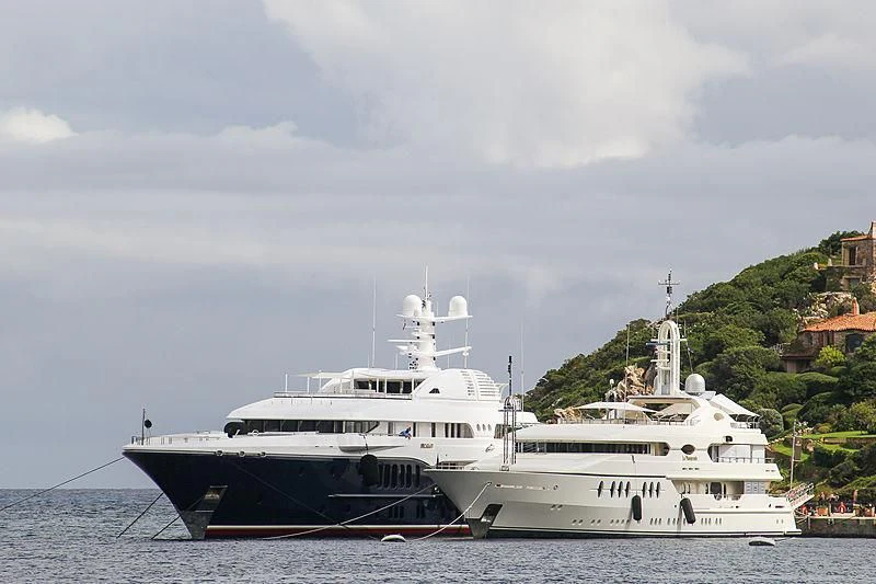 a couple of large boats in the water aboard SAMIRA Yacht for Sale