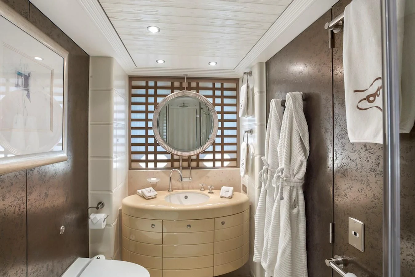 a bathroom with a sink and a mirror aboard SAMIRA Yacht for Sale