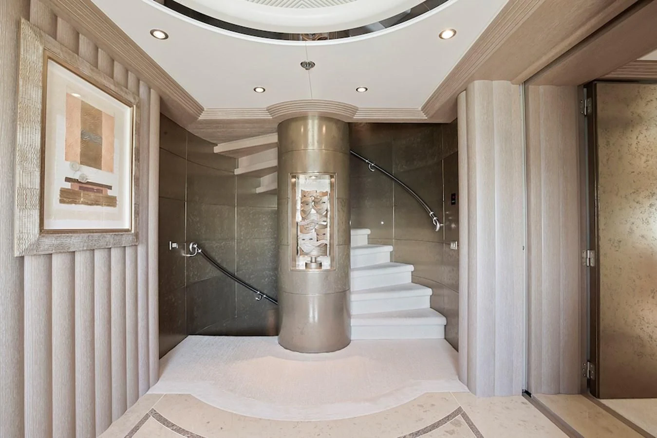 a large hallway with a staircase aboard SAMIRA Yacht for Sale