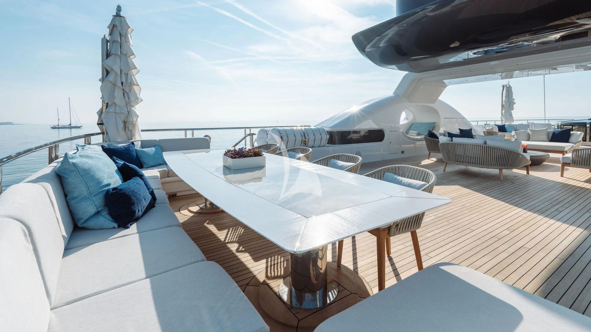 a large white boat on a deck aboard SAMIRA Yacht for Sale