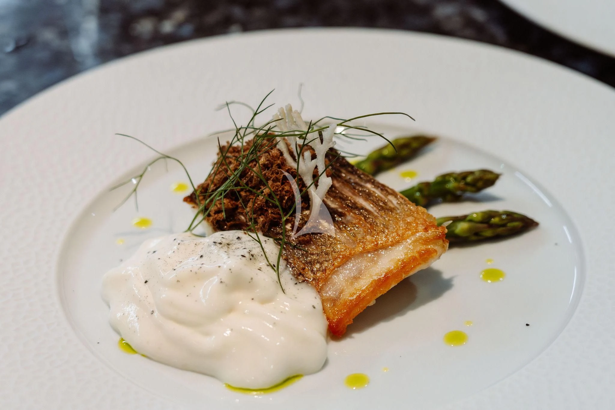 a plate of food aboard SAMIRA Yacht for Sale