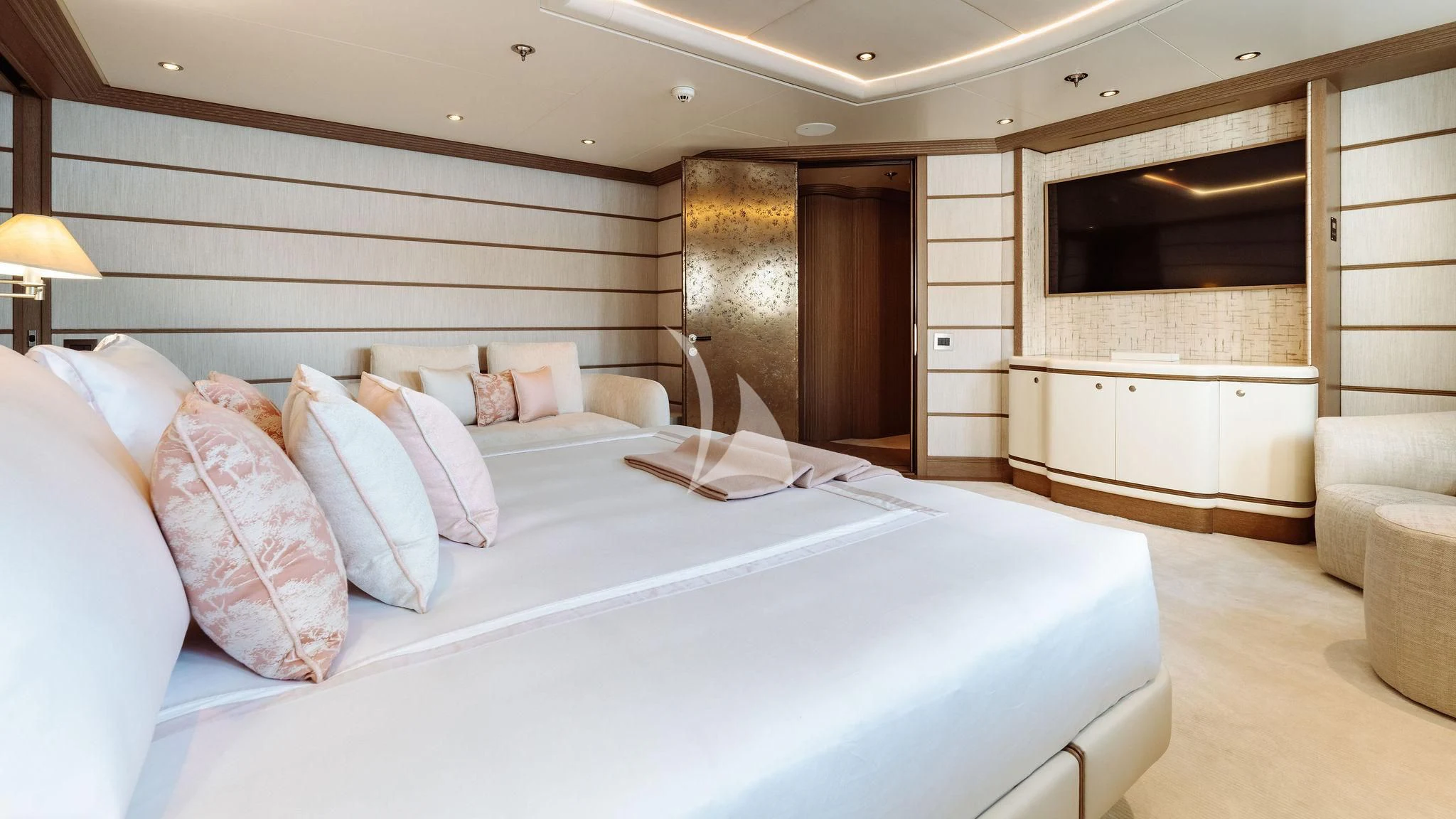 a large bed in a room aboard SAMIRA Yacht for Sale
