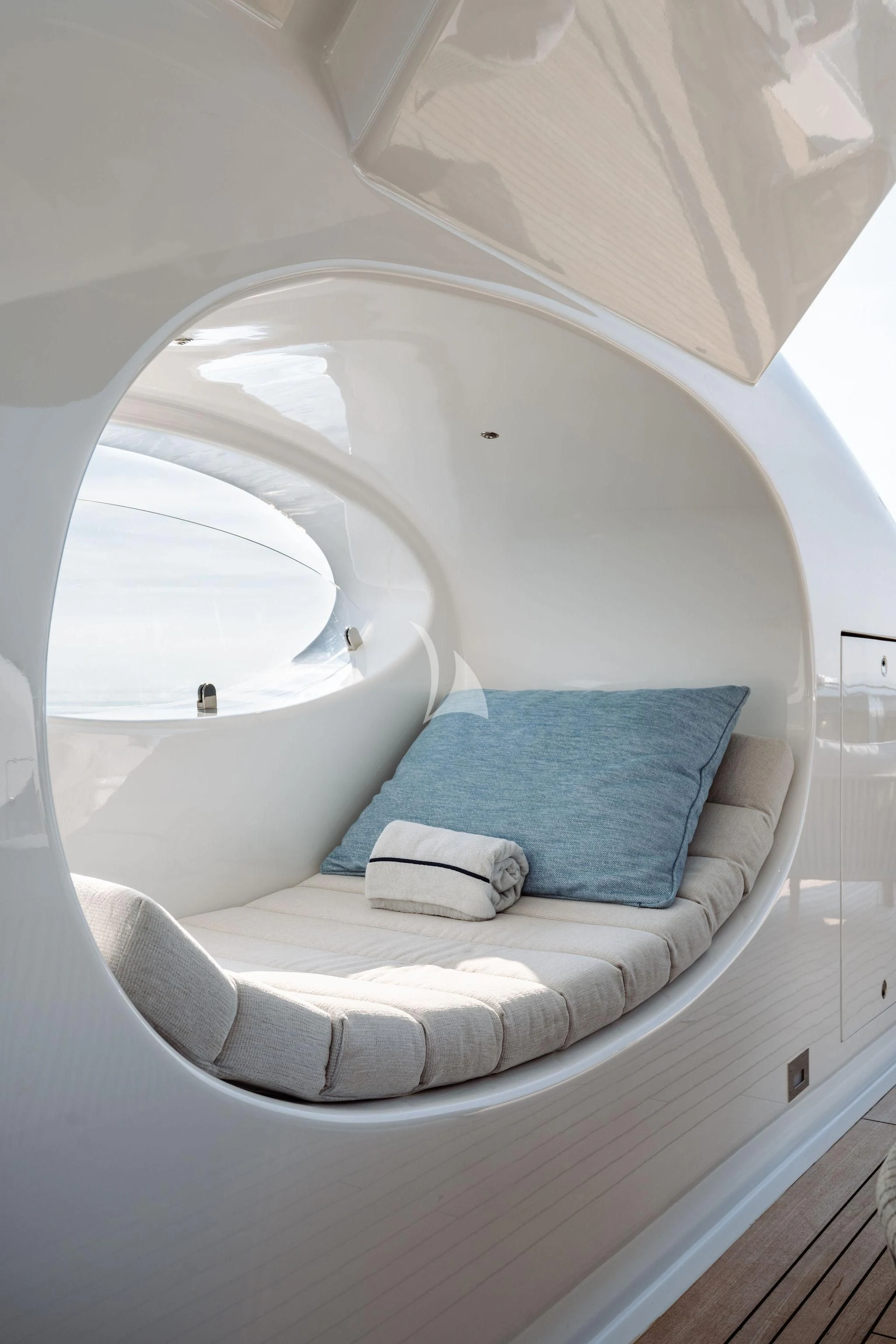 a bed with a blue pillow aboard SAMIRA Yacht for Sale