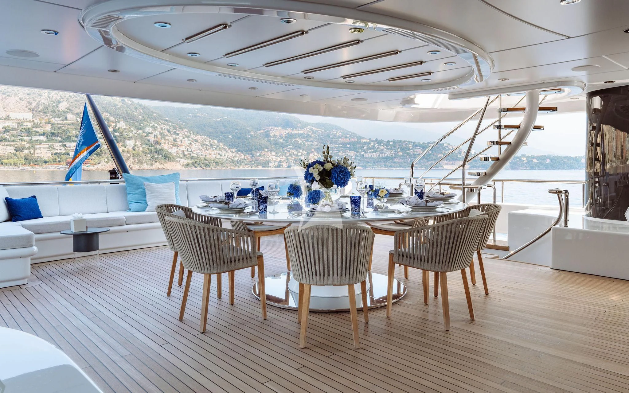 a table set for a dinner party aboard SAMIRA Yacht for Sale