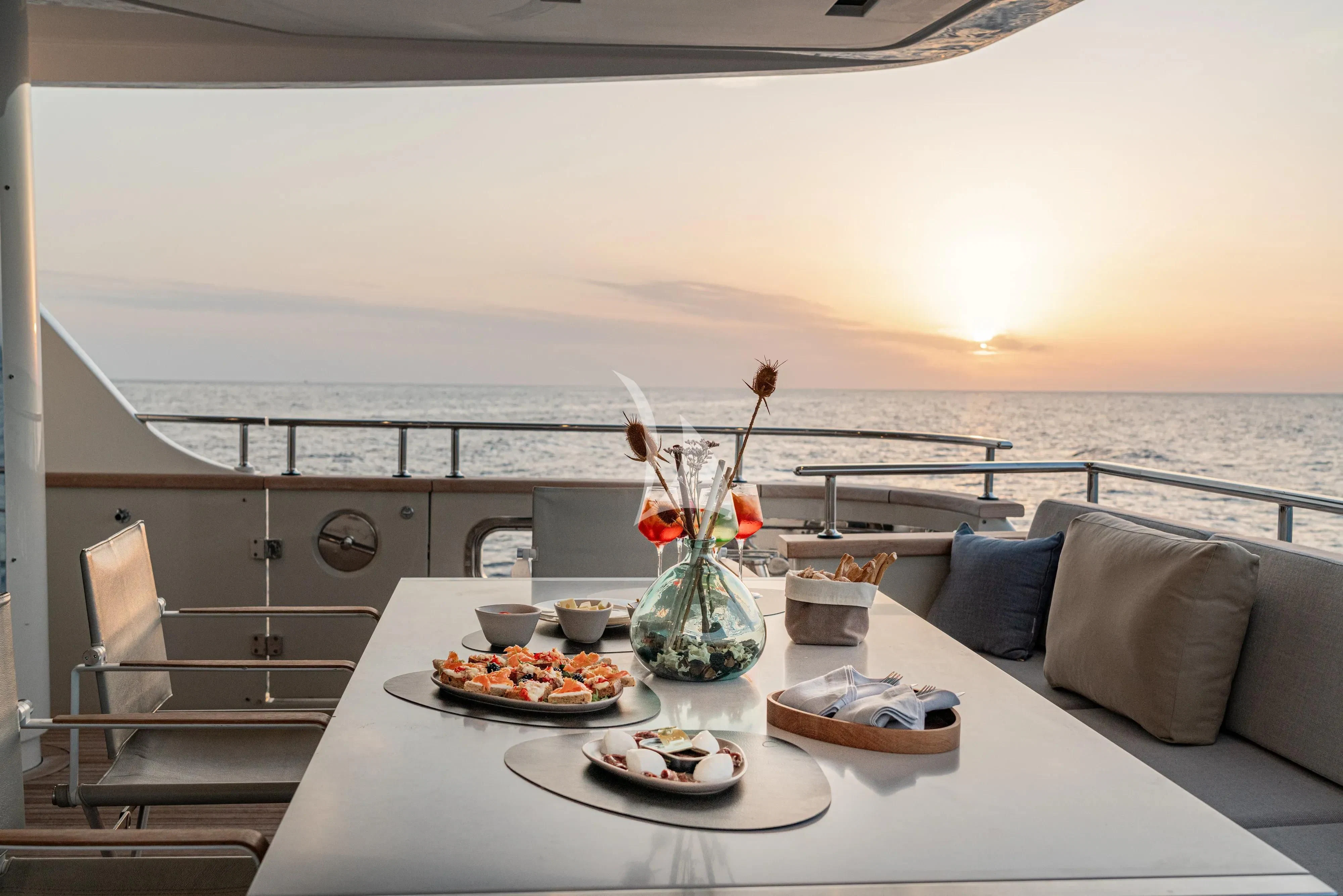 a table with food on it aboard UNICKA Yacht for Sale